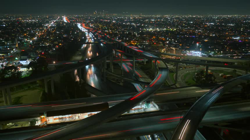 Heavy traffic drives on the freeway overpasses