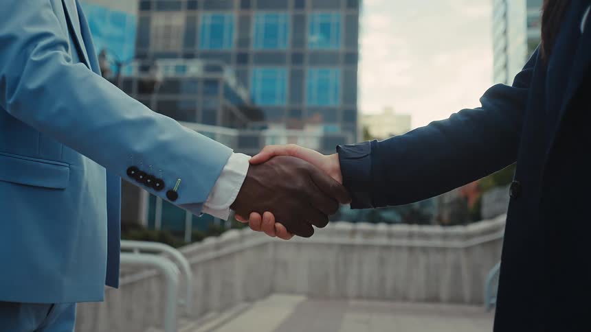 Two people shaking hands