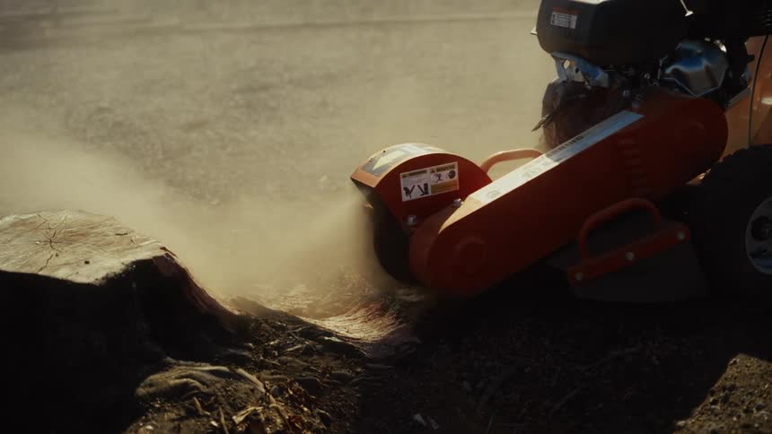 A person using a digging tool