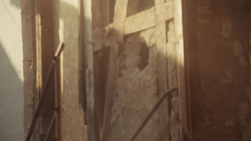 Concrete wall being broken