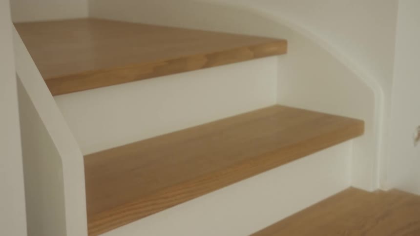 The wooden steps are in the home