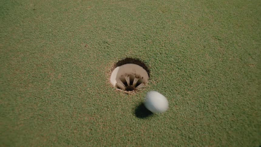 Person misses the target on a soft golf shot