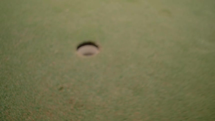 Golf ball hitting the target