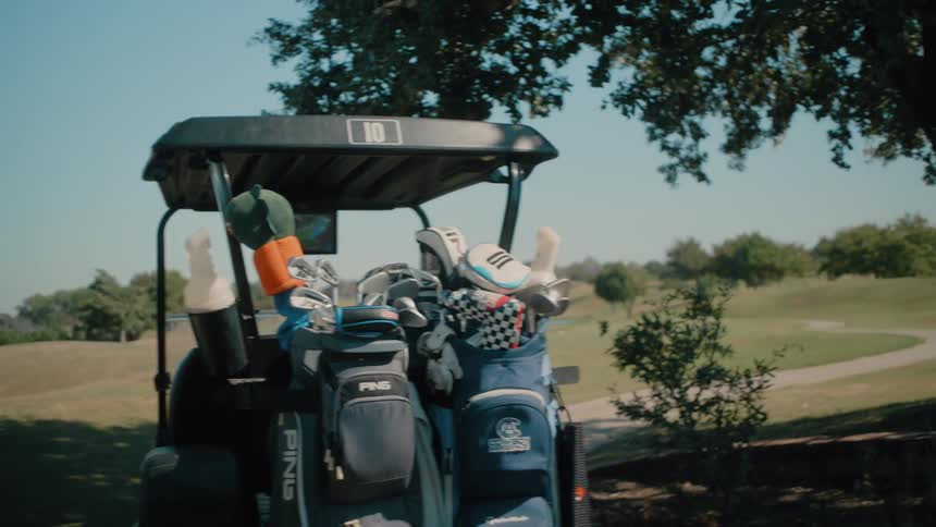 Man gets up from a golf cart