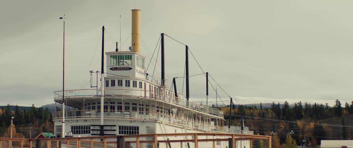 The historic paddlewheel ship is docked in the harbor