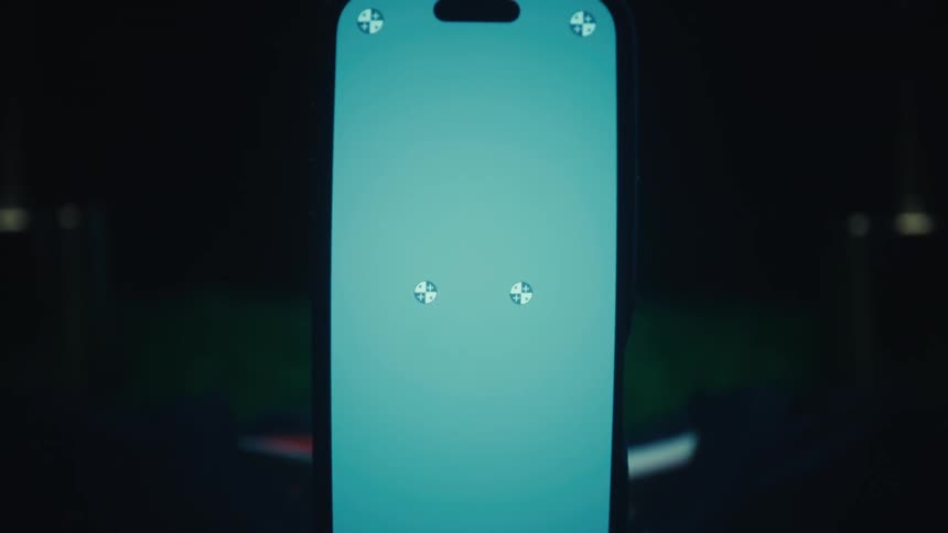 A close up of a smart phone in a room
