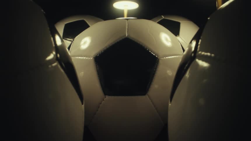 A close up of some soccer balls