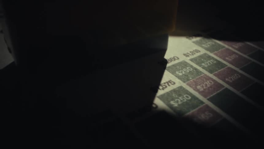 Red stamp with the word urgent marked on a financial document