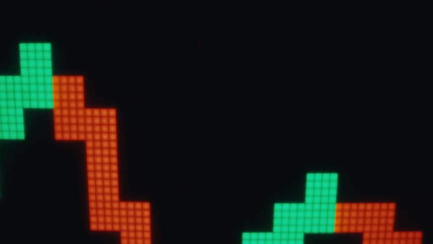 Pixelated zigzag line with green and red blocks on black background