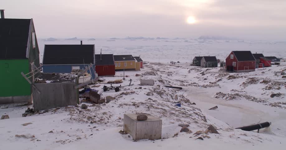 Rural village on an arctic region surrounded by snow outdoors during day time