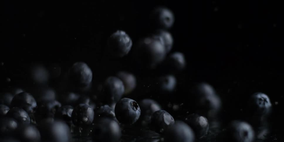 Blueberries fall and bounce when they land