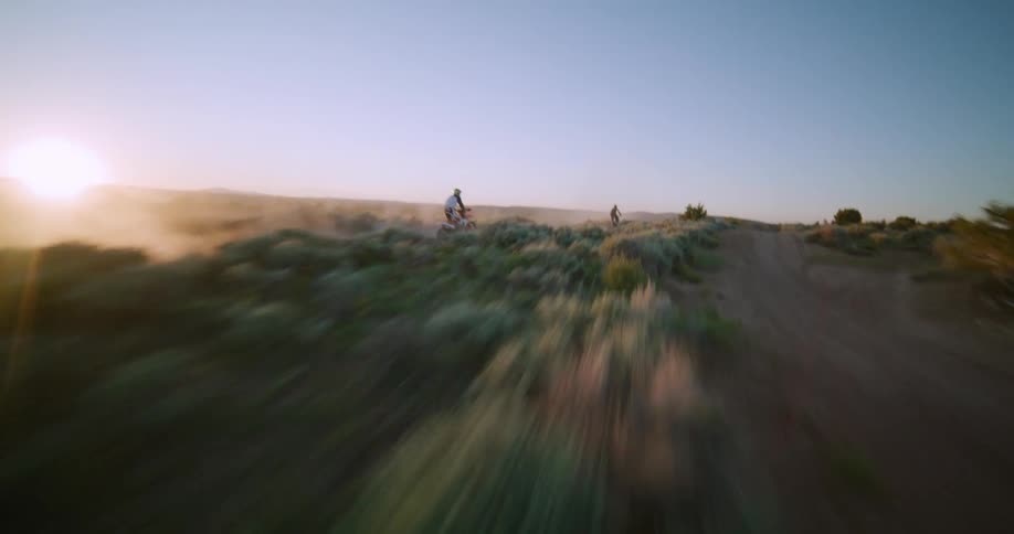 An aerial view of dirt bike riding on trails