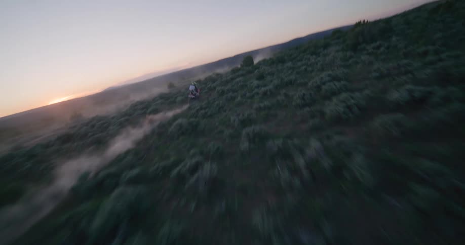 A person riding a dirt bike outdoors