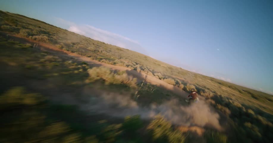 An aerial view of a person riding a dirt bike