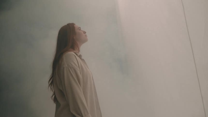 A woman standing in a room
