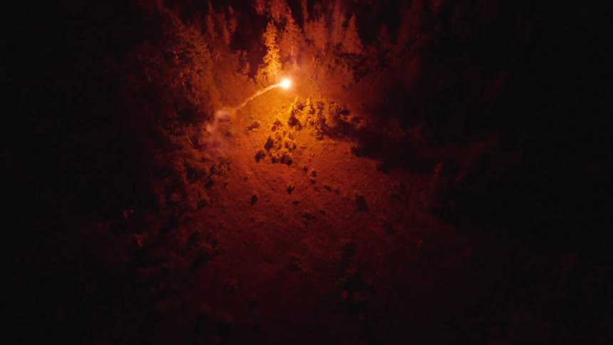 The fireball lands and leaves a trail of smoke as it moves