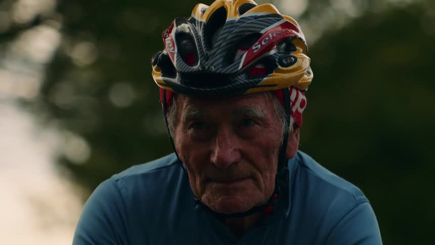 A man riding a bicycle outdoors