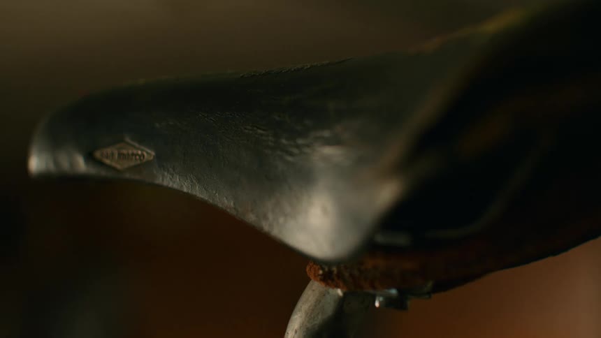 A close up of a seat on a bicycle