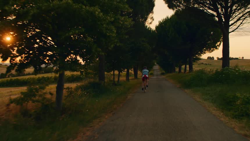 A person riding a bike outdoors