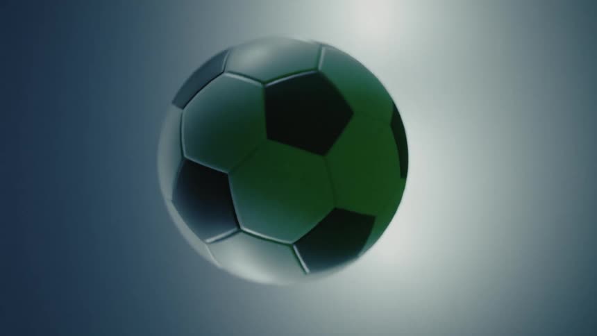 The soccer ball flies through the air