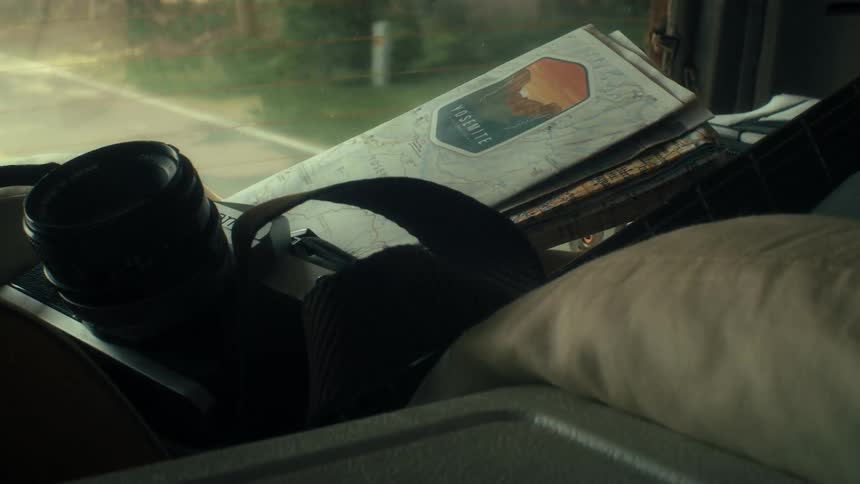 Maps are in the back of the moving car