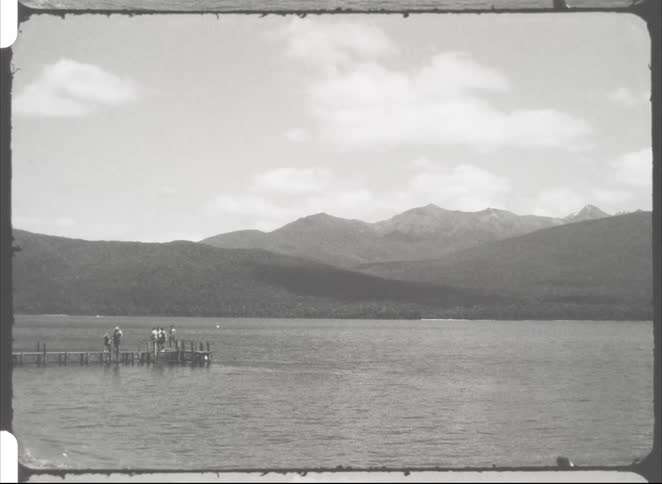 The crowd of people are on the pier