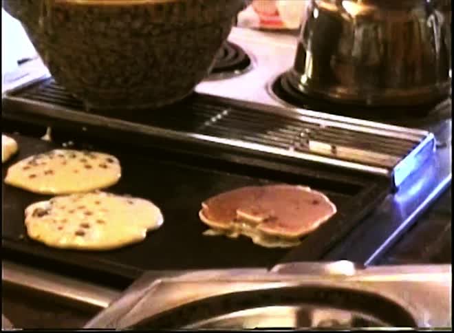Pancake being prepared on an ember