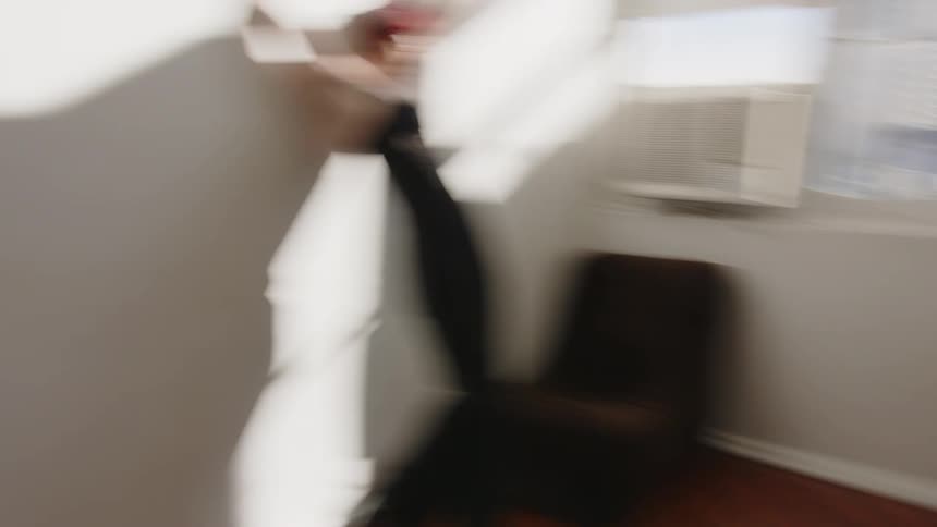 A portrait of a woman in a room