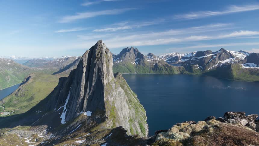 Rocky pointy mountain peaks around a fjord in Norway
