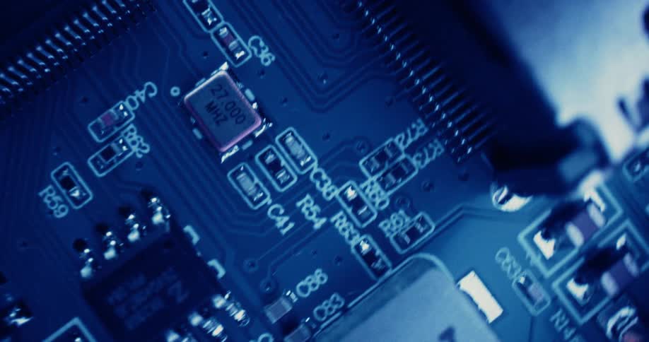 Lights flash over the electronic components on a motherboard