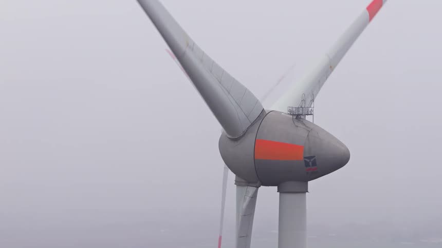 Two turbines in the fog