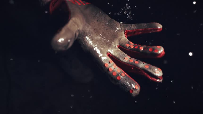 A glove hand that is very wet