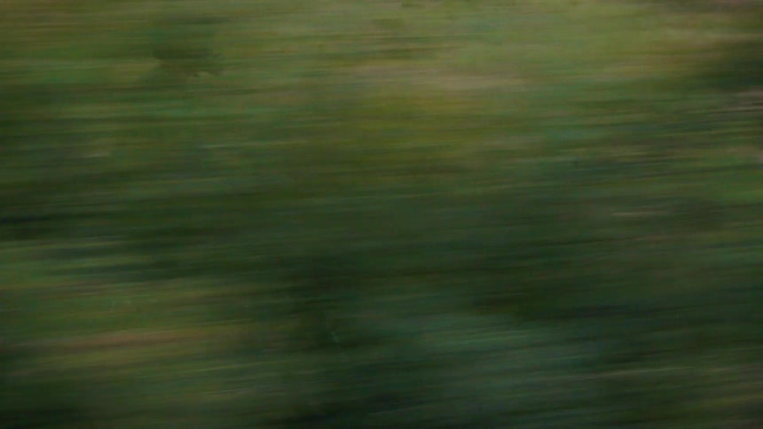 A person riding a dirt bike outdoors