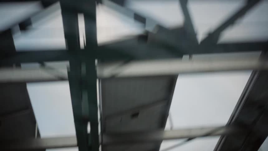 Steel beams line above a bridge