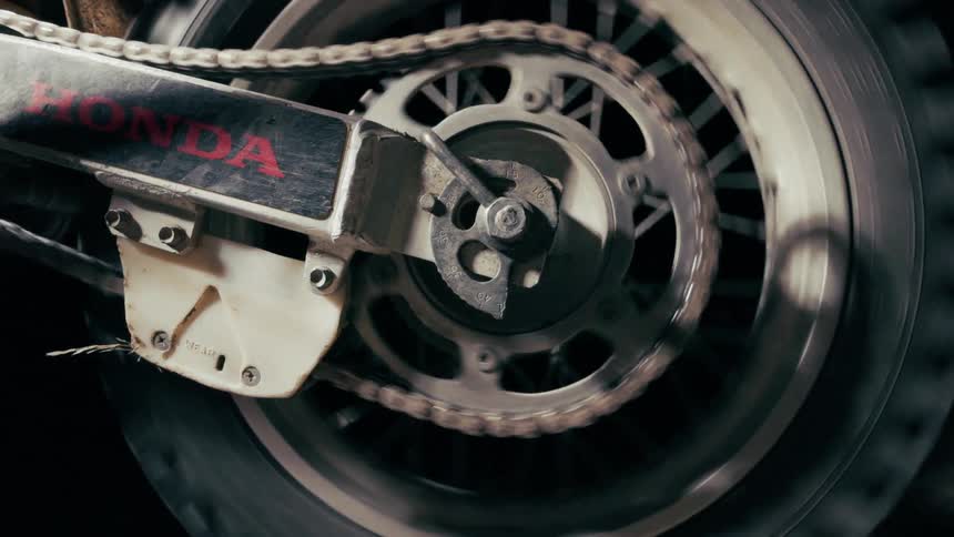 The dirt bike wheel spins