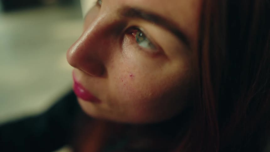 A portrait of a woman in a room
