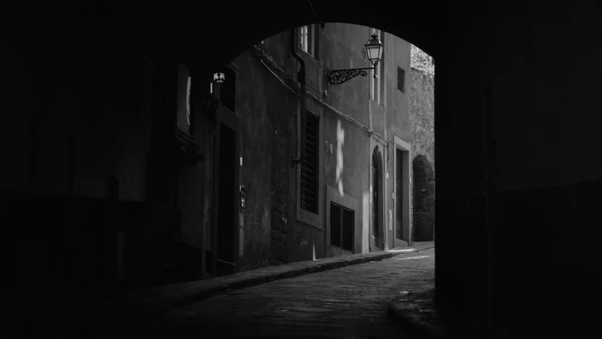 The dark overpass is in the city