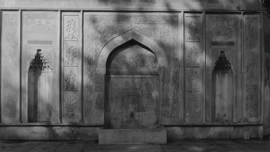 There is stone arched doorway on the temple