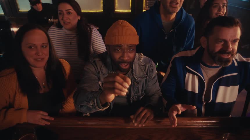 A group of people reacting to something