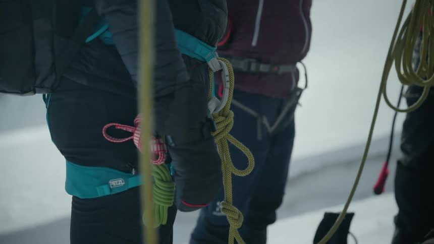 A group of people hiking with ropes