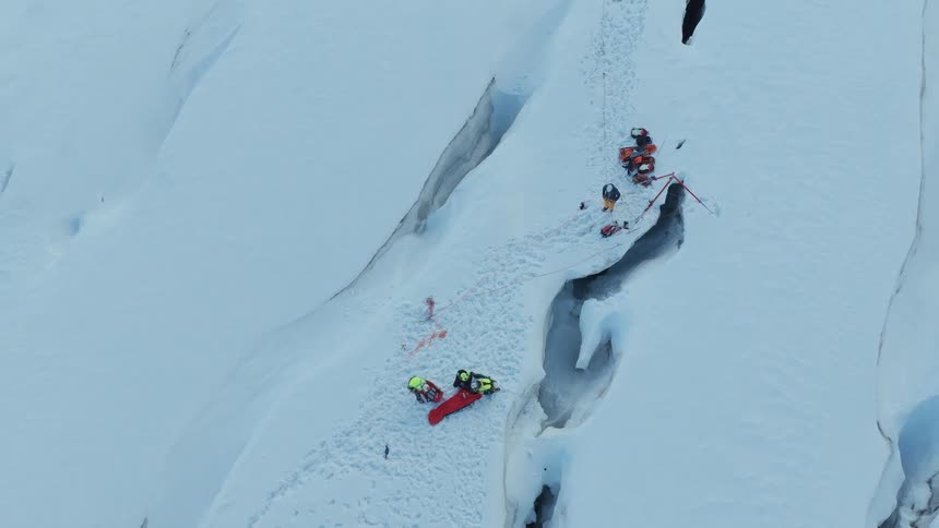 A group of people that are crashed skiing