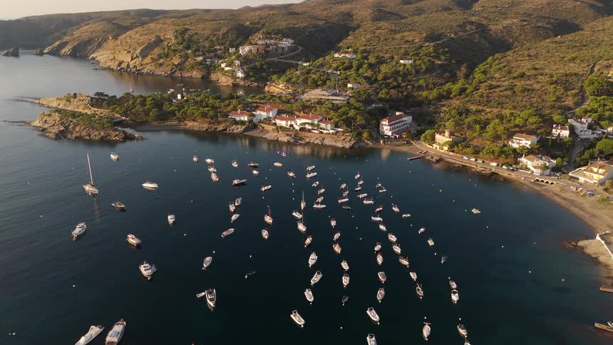 Boats are anchored all over the shore line