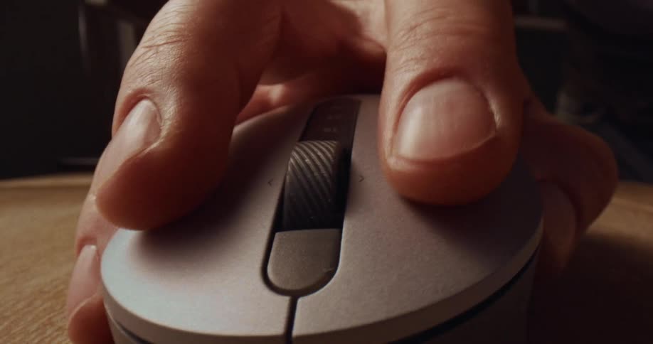 A person using a computer mouse
