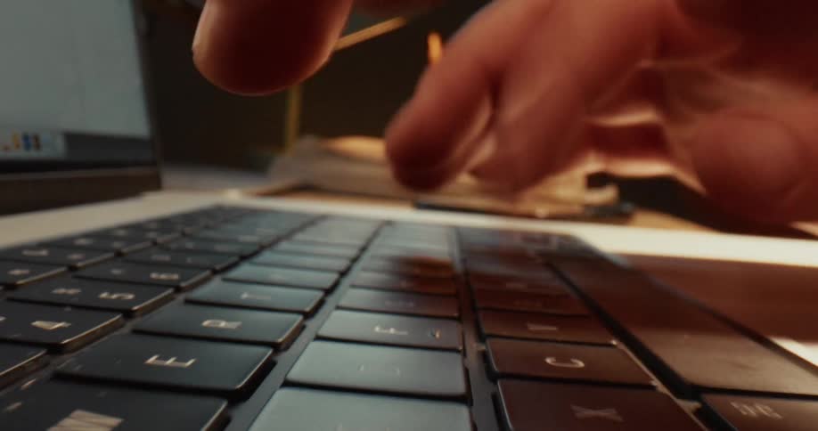 Fingers typing on a keyboard