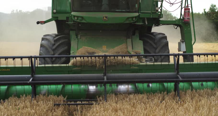 Agricultural harvester moving through a grain field during harvesting