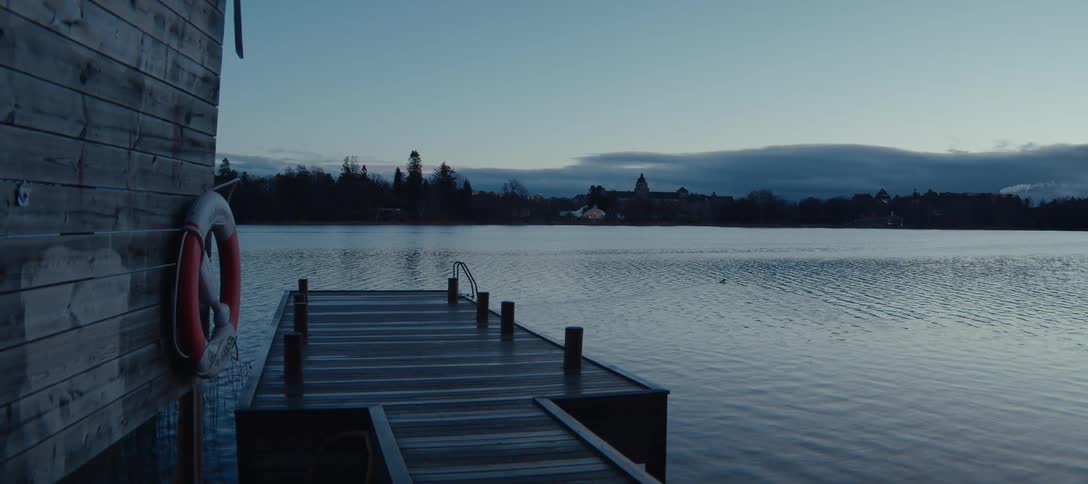 A view of a lake with a pier on it