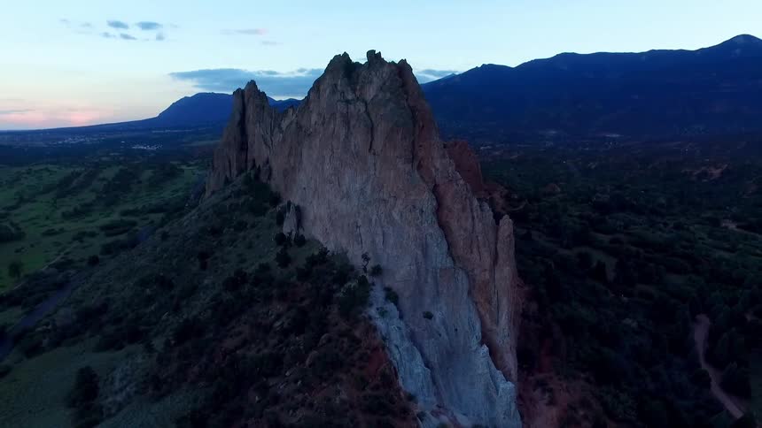 View of a large rock formation in a mountain range