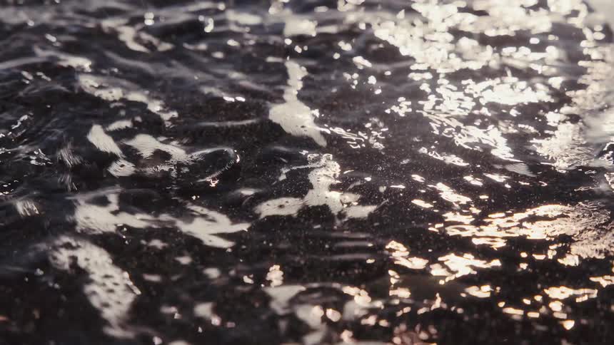 Seawater flowing onto the sand