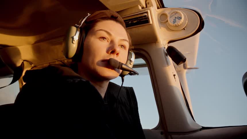 Pilot watches the horizon during flight in light aircraft