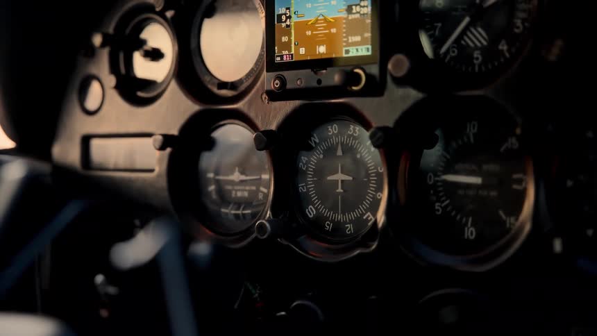 Flight instrument panel with analog gauges and active electronic display